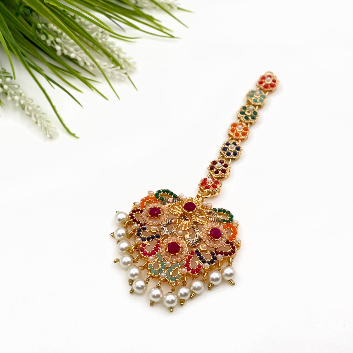 Nauratan Tika with Earrings